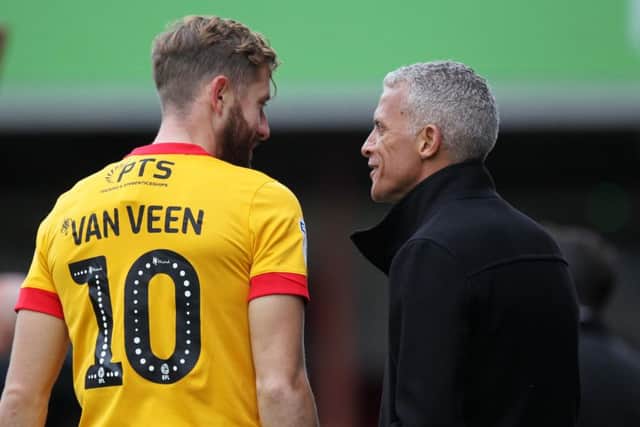 Kevin van Veen with Cobblers boss Keith Curle