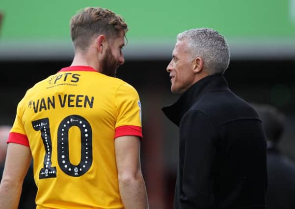 Kevin van Veen with Cobblers boss Keith Curle