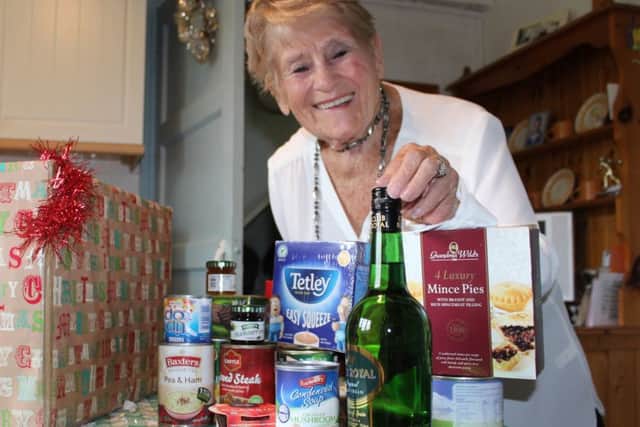 One of the happy recipients of a Christmas hamper from R.A.B.I.