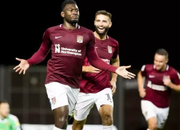Aaron Pierre celebrates scoring against Oxford earlier in the competition