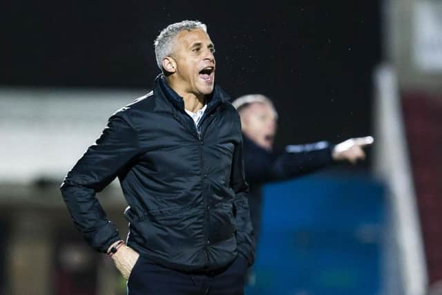 Keith Curle gives out the orders during Tuesday's game. Picture: Kirsty Edmonds