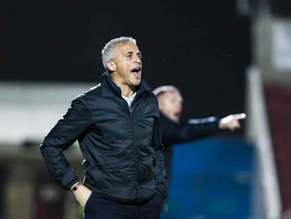 Keith Curle gives out the orders during Tuesday's game. Picture: Kirsty Edmonds