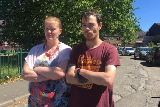 Krisztian Piko and his girlfriend Rebecca Trusler in Exeter Place, which they want to see made subject to a parking permit scheme.