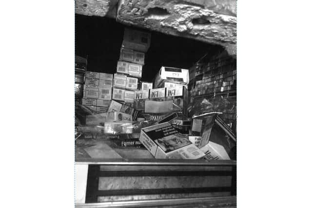 The secret compartment above the back door was full of cigarettes