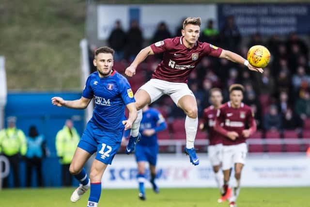 Sam Hoskins in action for the Cobblers against Carlisle
