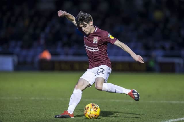 George Cox on debut for the Cobblers. Picture: Kirsty Edmonds