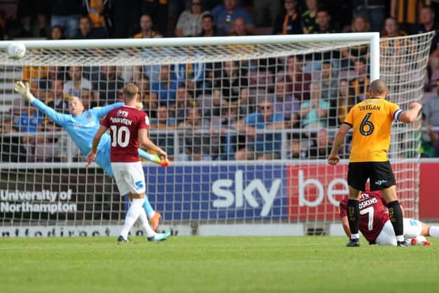 Gary Deegan's late goal grabbed a 2-2 draw for Cambridge in the reverse fixture