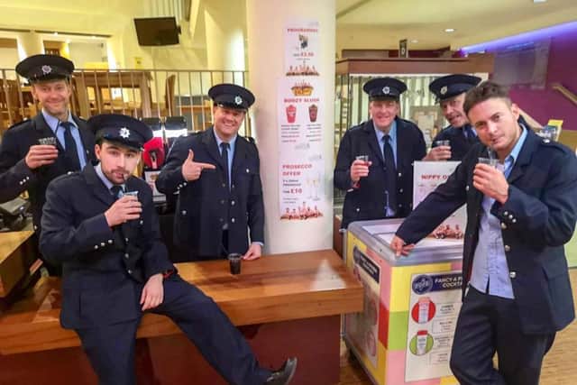 The Full Monty cast in the foyer of the Royal & Derngate