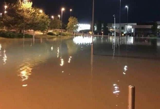 This picture shows the school just hours after the flash flooding hit the town last year.