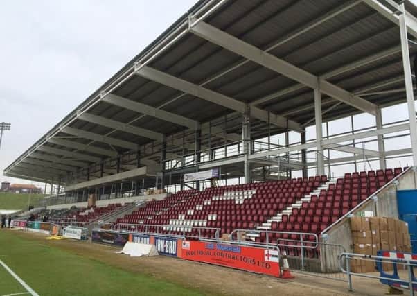 The unfinished east stand at the PTS Academy Stadium