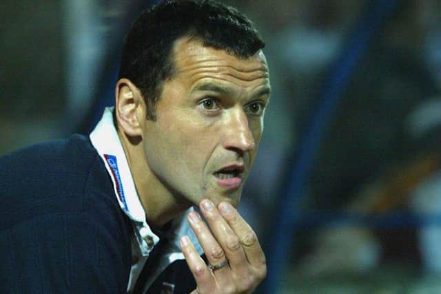 Colin Calderwood looks pensive during the play-off semi-final at Mansfield