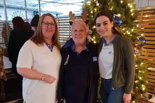 Barbara pictured (centre) with her helpers Jo Payne (left) and Sophie Humphries (right).
