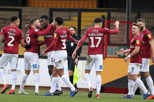 Cobblers celebrate Aaron Pierre's opener. Pictures: Sharon Lucey
