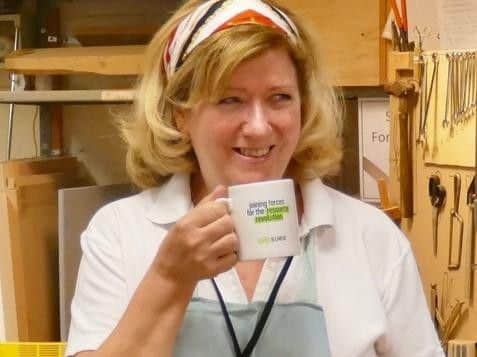 Theresa Leadbetter enjoys a cup of tea at the shed, which is now open to men and women.