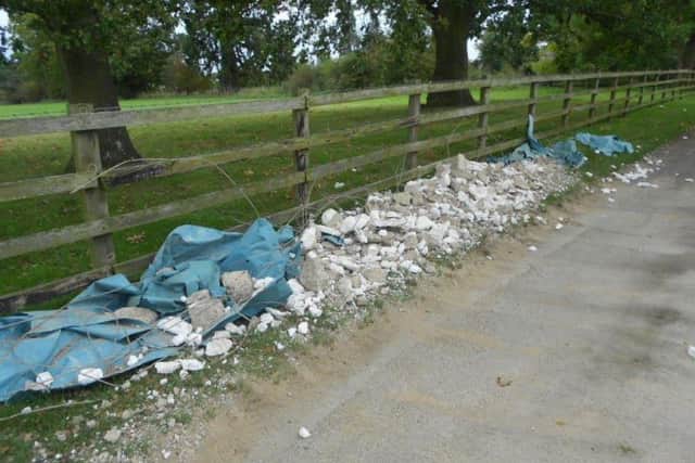 The rubble after is was swept to the side of the road by a council clean-up team