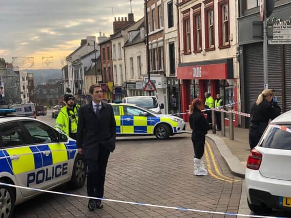Two men have been charged over the armed raid in Northampton town centre in December.