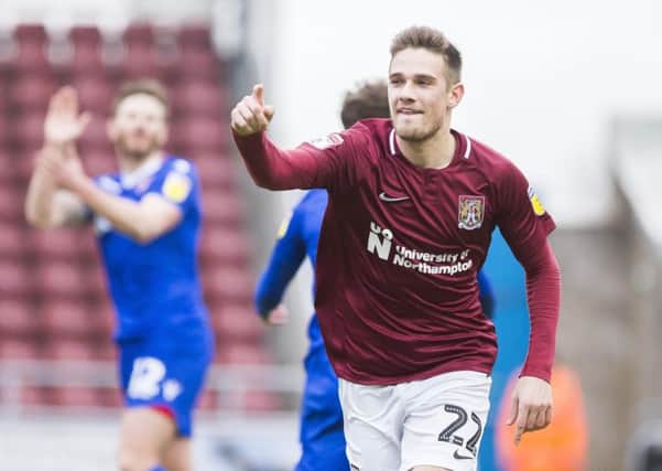 Timi Elsnik celebrates opening the scoring for the Cobblers (Picture: Kirsty Edmonds)