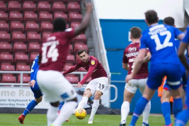 Jack Bridge goes for goal