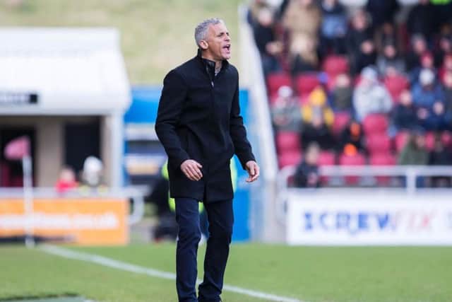 Cobblers boss Keith Curle issues instructions to his players during Saturday's 1-1 draw with Morecambe (Picture: Kirsty Edmonds)