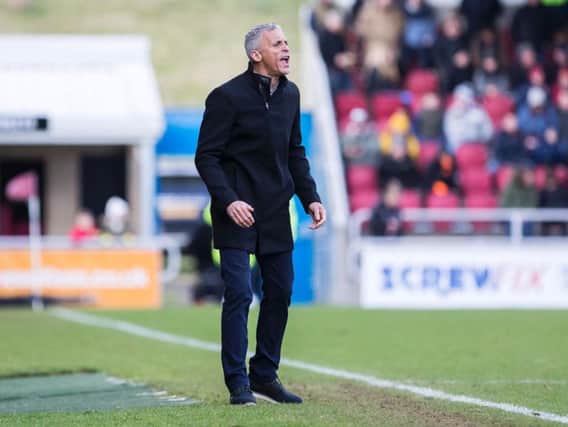 Cobblers boss Keith Curle issues instructions to his players during Saturday's 1-1 draw with Morecambe (Picture: Kirsty Edmonds)