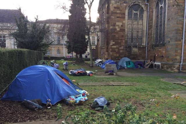 The homeless encampment outside All Saints Church