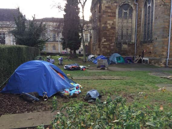 The homeless encampment outside All Saints Church