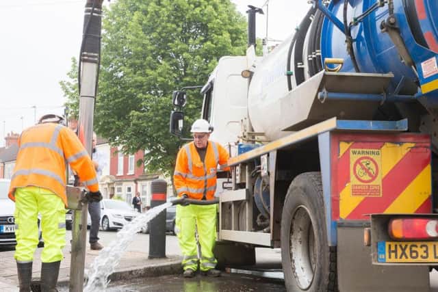 Contractors were sent to clean the street's drains the day after the flood.