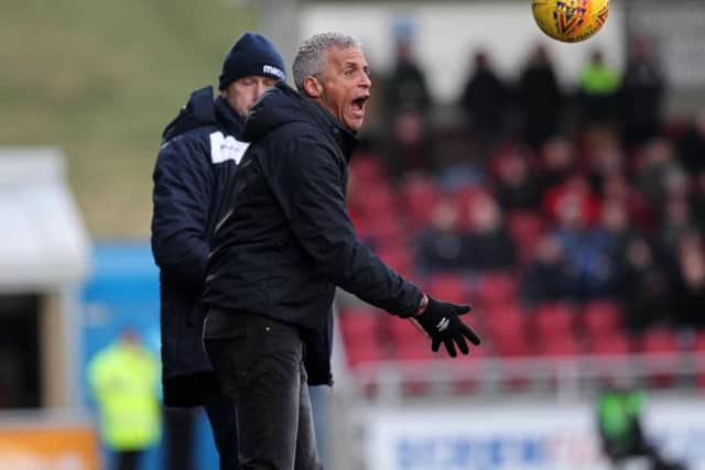 TOUGH DAY: Keith Curle is a picture of frustration during his side's defeat to Colchester. Picture: Sharon Lucey
