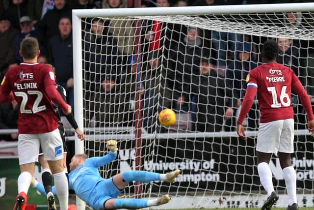 Helpless spectator as shots regularly flew past him, although was down well to keep out Pell's late spot-kick and also spared Facey's blushes when rushing off his line to clear the wing-back's weak back pass... 6