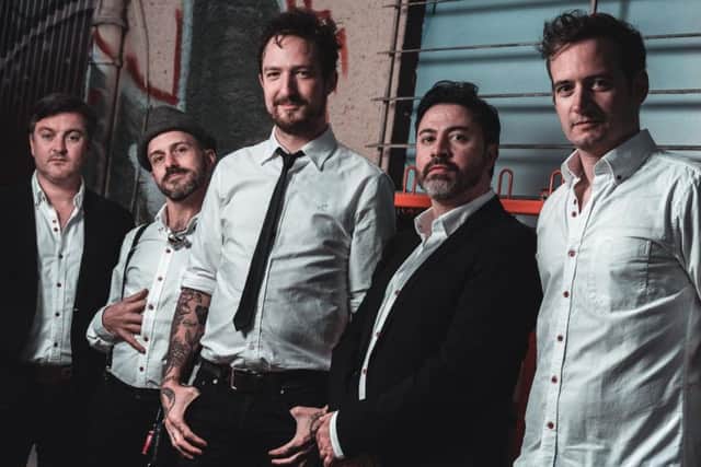 Frank Turner and his band The Sleeping Souls