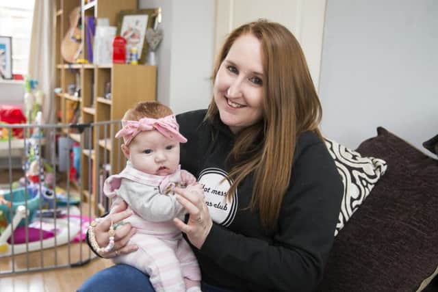 Three-month-old Quinn is the apple of her mums' eyes. Here she is pictured with Jessica. Credit: Kirsty Edmonds.