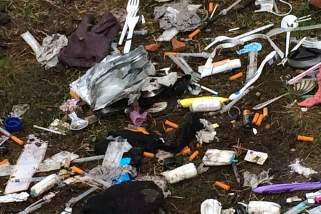 Piles of syringes and plastic waste was left out in the open on 'Rat Island'.