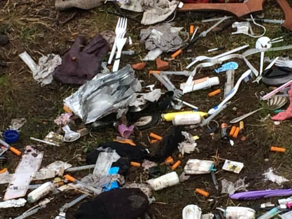 Piles of syringes and plastic waste was left out in the open on 'Rat Island'.
