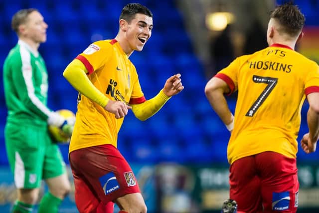 Joe Powell is all smiles after Sam Hoskins' second goal