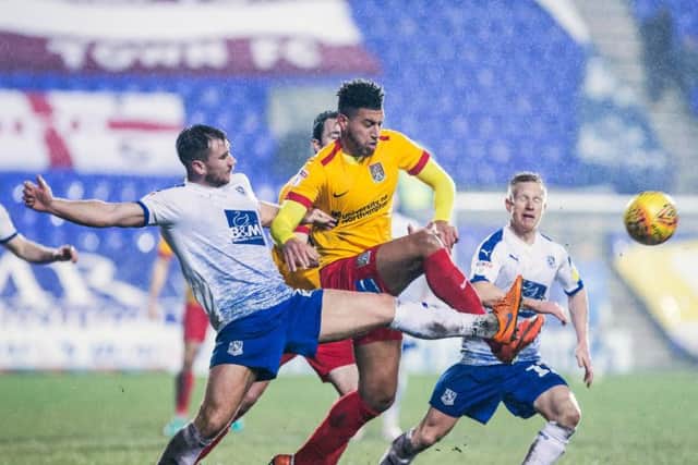 Daniel Powell gets stuck in during the Cobblers' win at Tranmere