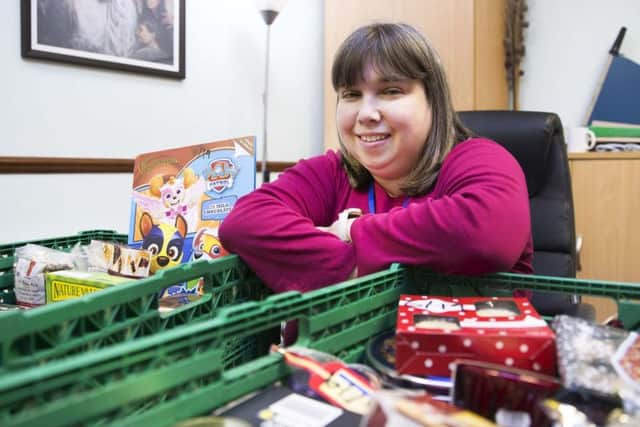 Food bank manager Jo Alderman co-ordinates the 15 volunteers who pick up the food from the supermarkets, pack the parcels and hand them out.