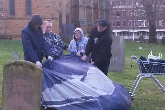 Five friends from Oasis House cleaned up the Holy Sepulchre churchyard.