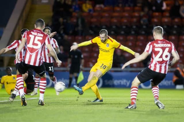 Kevin van Veen equalised for Cobblers at Lincoln City in the FA Cup in November, but the hosts grabbed a late winner. Pictures: Kirsty Edmonds