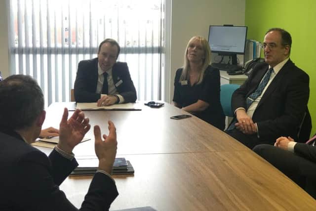 Health Secretary Matt Hancock (second from left) with deputy chief executive Deborah Needham and (far right) Michael Ellis