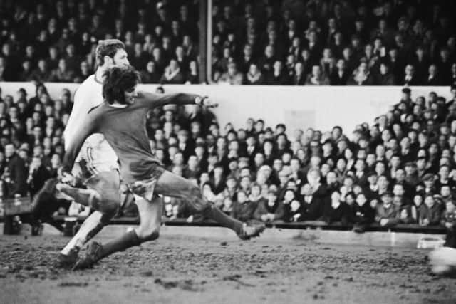 George Best in action for Manchester United in their 8-2 win over the Cobblers at the County Ground in 1970. The heavy loss is club historian Frank Grande's favourite game from watching Town for the past 60 years (Picture: Getty Images)