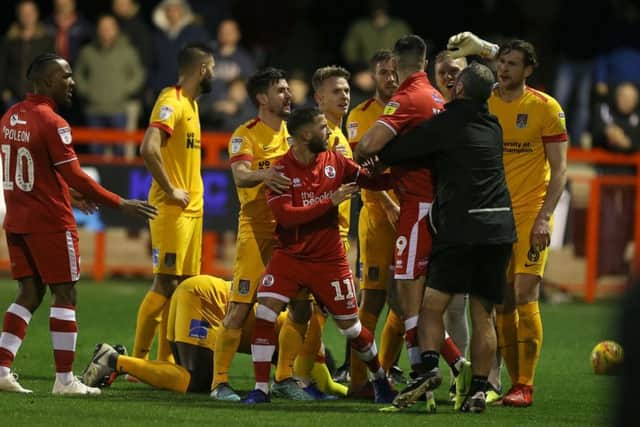 Tempers boiled over when Cobblers played at Crawley in December as Ollie Palmer saw red for elbowing Aaron Pierre. Pictures: Pete Norton/Getty Images