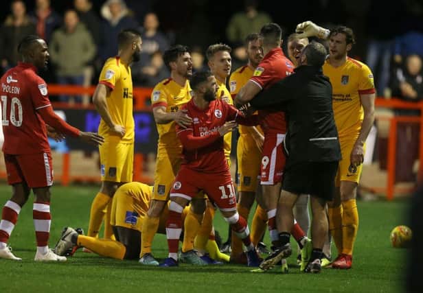 Tempers boiled over when Cobblers played at Crawley in December as Ollie Palmer saw red for elbowing Aaron Pierre. Pictures: Pete Norton/Getty Images