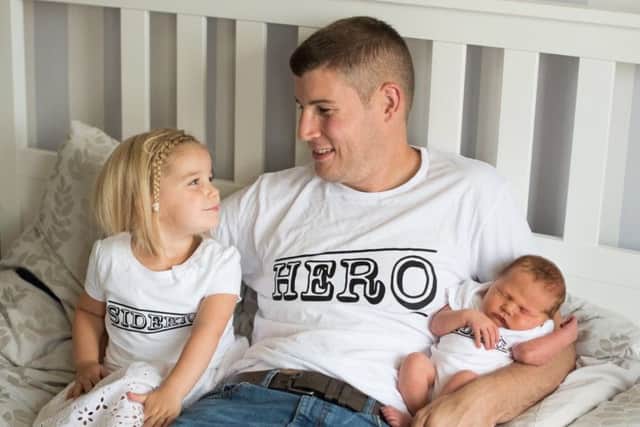Brett with daughters Freya and Ella