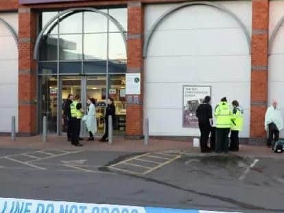 People were seen wrapped up in blankets outside the Kettering store