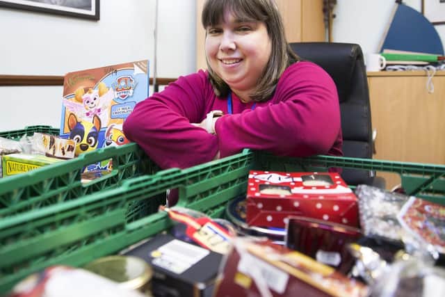 The food bank does receive donations from supermarkets, as well as pastries and breads from Greggs, but it is reliant on donations from the general public. Pictured: food bank manager Jo Alderman.