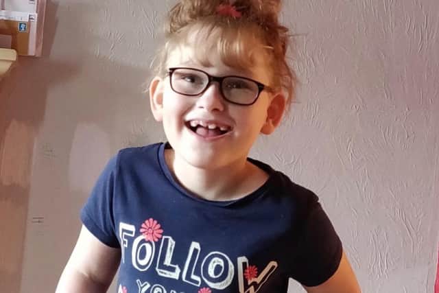 Kayla, 8, is fundraising for an operation which will help her walk again.