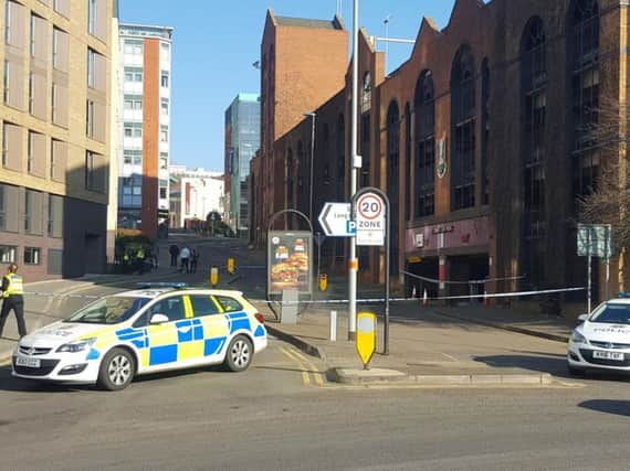 Northamptonshire Police taped off Swan Street this morning and are still on scene this afternoon. Credit: @Matt_O___