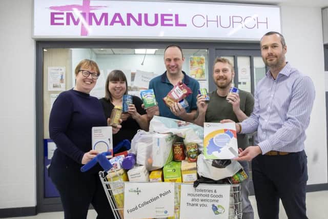 Pictured l-r: Tina Munns (Novacroft), Jo Alderman and Paul Foster (Weston Favell Centre Food Bank), Jonathon Turner (Novacroft) and Peter Cox (NCF). Pictures: Kirsty Edmonds.