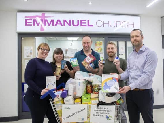 Pictured l-r: Tina Munns (Novacroft), Jo Alderman and Paul Foster (Weston Favell Centre Food Bank), Jonathon Turner (Novacroft) and Peter Cox (NCF). Pictures: Kirsty Edmonds.