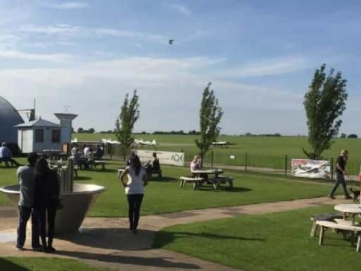 Residents or visitors can enjoy a cool drink in the large garden at The Aviator Hotel in Sywell overlooking the busy airfield